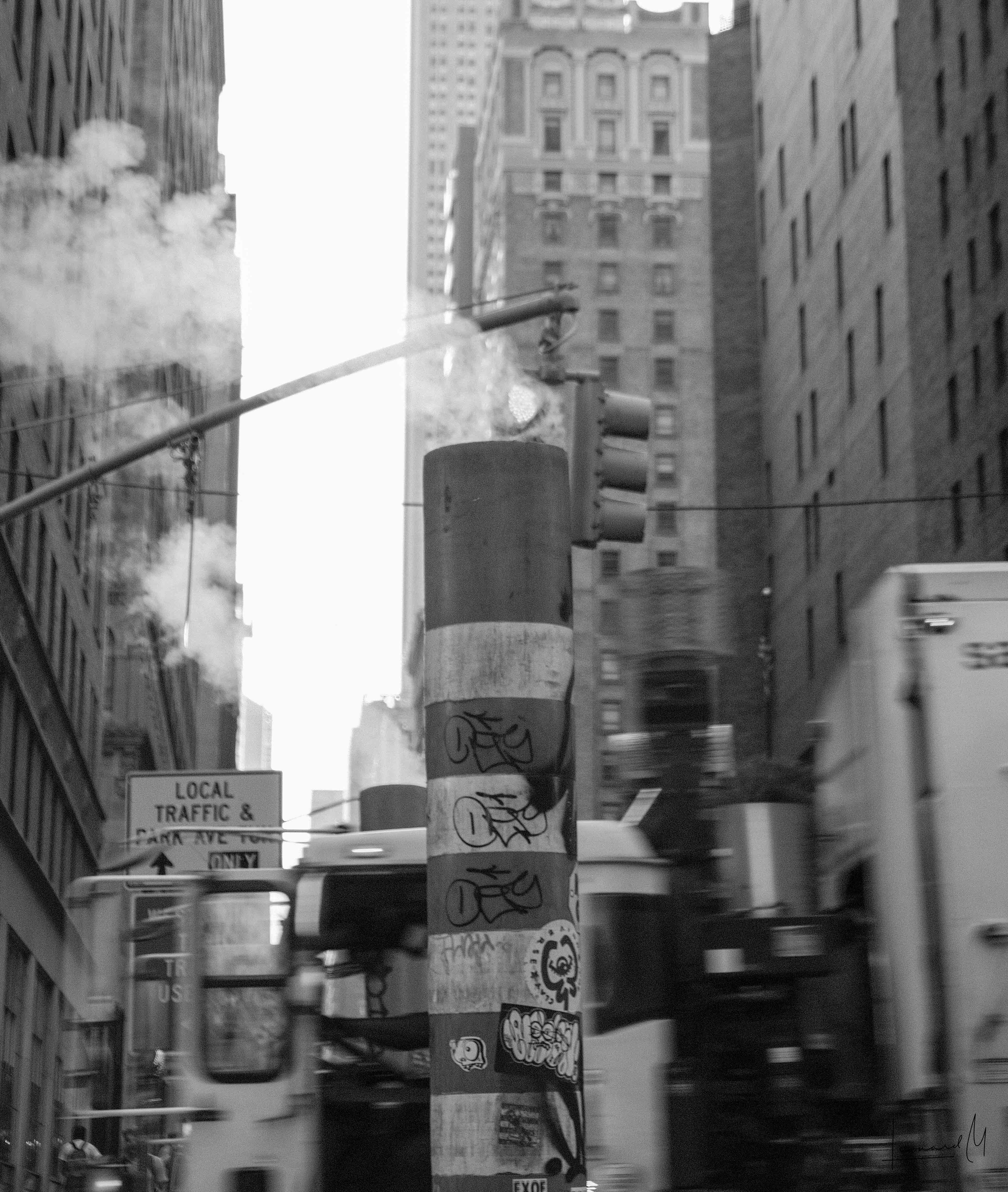 Steam and smoke rising from the city streets creating an atmospheric scene.
