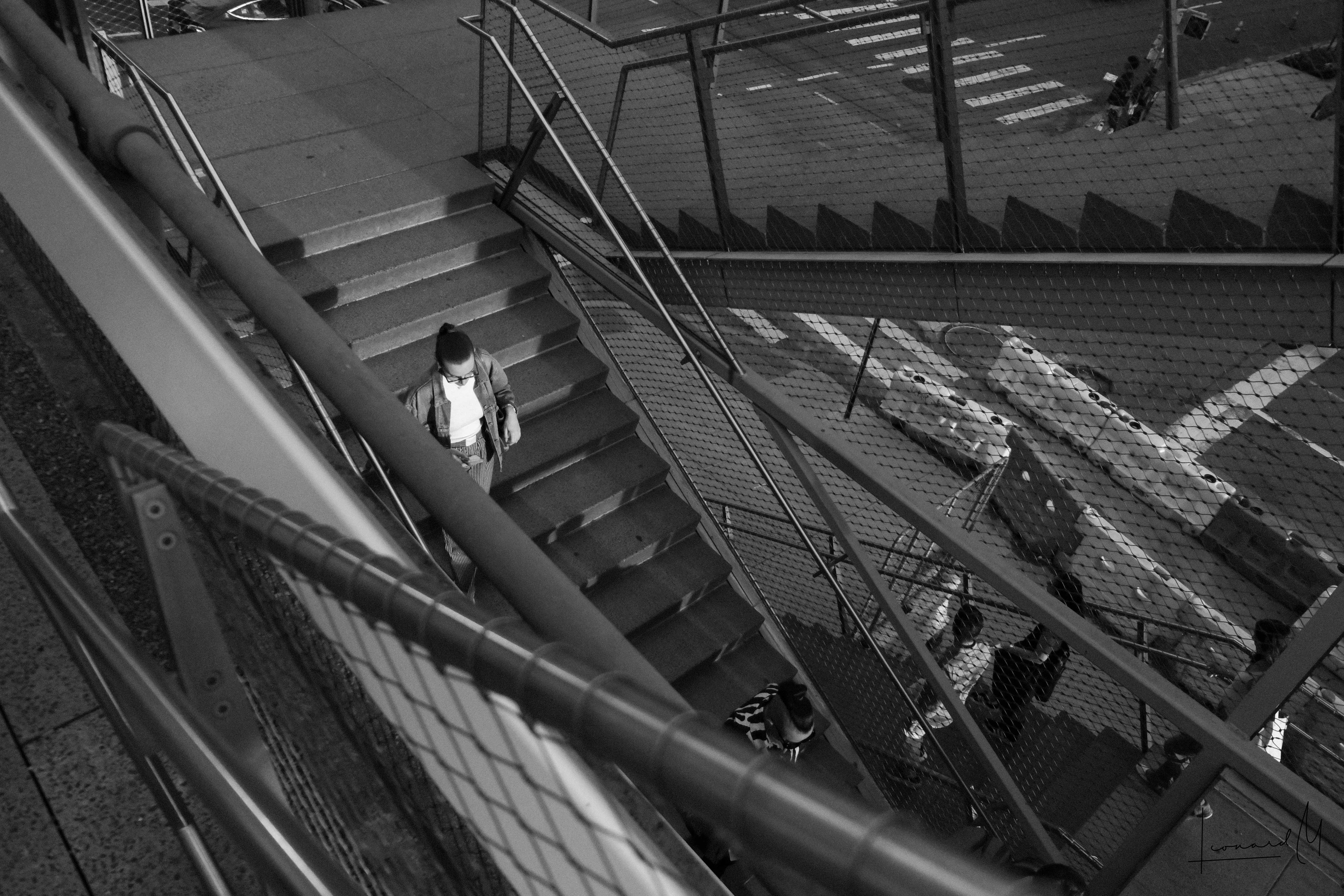 Woman going down stairs