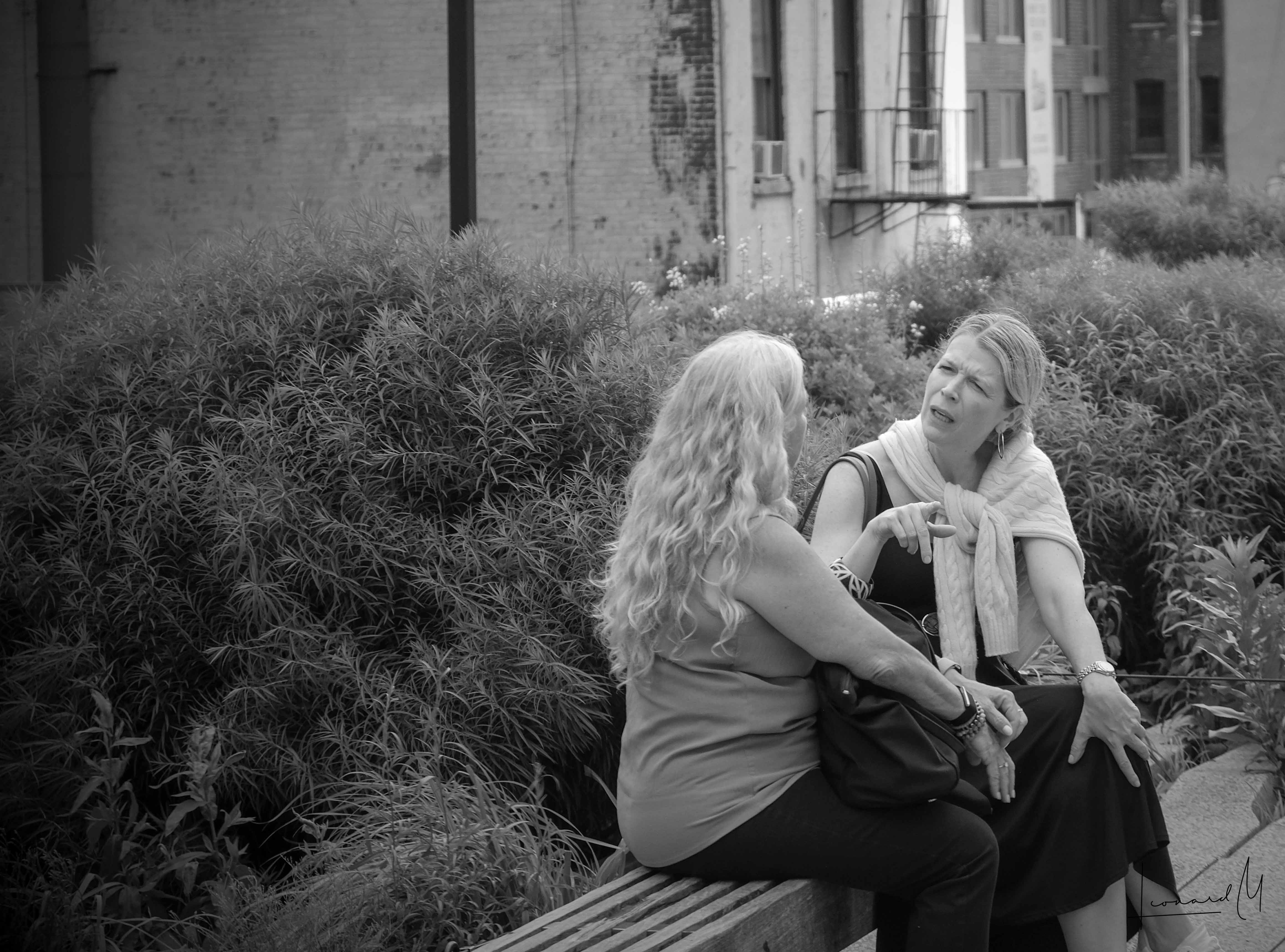 Two women talking while sitting
